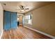 This bedroom features a unique blue sliding door and an archway at 429 E Gore St, Orlando, FL 32806