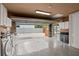 Garage featuring a laundry area and epoxy flooring at 429 E Gore St, Orlando, FL 32806