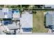 View of the house with a rooftop and lawn at 435 Jessamine Ave, New Smyrna Beach, FL 32169