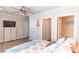 Spacious bedroom with an ensuite bathroom and nautical-themed decor at 435 Jessamine Ave, New Smyrna Beach, FL 32169