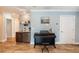 Entertainment area featuring mini-bar, cabinets, granite countertop, and a small grand piano at 435 Jessamine Ave, New Smyrna Beach, FL 32169