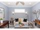 Cozy living room with a comfortable sofa, accent tables, soft lighting, and modern decor accents at 435 Jessamine Ave, New Smyrna Beach, FL 32169