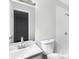 Bright bathroom featuring a white single vanity and a tiled walk-in shower at 4425 Signal Hill Rd, Orlando, FL 32808