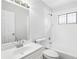A full bathroom featuring a white single sink vanity, a tub and shower and white tile at 4425 Signal Hill Rd, Orlando, FL 32808
