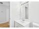 Bright bathroom with a single vanity and a modern faucet with updated fixtures at 4425 Signal Hill Rd, Orlando, FL 32808