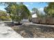 Home exterior view, featuring landscaping and sidewalk at 4425 Signal Hill Rd, Orlando, FL 32808