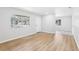 Spacious living room showcasing hardwood floors, natural light, and an open floor plan at 4425 Signal Hill Rd, Orlando, FL 32808