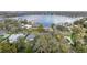 Aerial view of a neighborhood with lake views and lush landscaping at 450 Lakewood Dr, Winter Park, FL 32789