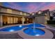 Resort style backyard featuring pool, spa and covered patio, ideal for entertaining at 450 Lakewood Dr, Winter Park, FL 32789