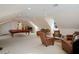Large game room with a pool table, comfortable chairs and natural light at 450 Lakewood Dr, Winter Park, FL 32789