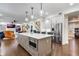 This gourmet kitchen boasts a large island, modern appliances, ample counter space, and an open layout at 450 Lakewood Dr, Winter Park, FL 32789