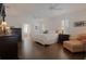 A bright and spacious main bedroom with hardwood floors and plenty of natural light at 450 Lakewood Dr, Winter Park, FL 32789