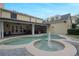 Beautiful backyard pool with a fountain feature and outdoor entertainment area at 450 Lakewood Dr, Winter Park, FL 32789