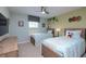 Themed bedroom with twin beds, a ceiling fan and large window for natural light at 4879 Clock Tower Dr, Kissimmee, FL 34746