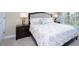 Comfortable bedroom with neutral carpet and a large window for natural light at 4879 Clock Tower Dr, Kissimmee, FL 34746
