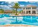 Resort-style pool area with a Tiki hut and ample lounge seating at 4879 Clock Tower Dr, Kissimmee, FL 34746