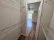 Walk-in closet with wire shelving and view into open room at 5128 Conroy Rd # 725, Orlando, FL 32811