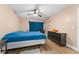Bright bedroom with neutral tones and ceiling fan. Perfect for relaxation and rest at 5201 Vineland Rd # 112, Orlando, FL 32811