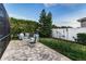 Backyard with an outdoor seating area, mature landscaping, and a tranquil setting perfect for relaxing at 6148 Gracie Pl, Lakeland, FL 33812