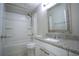 Clean bathroom with a tub-shower, granite countertop vanity, and neutral tones, creating a peaceful space at 634 Steamboat Ct # 171, Altamonte Springs, FL 32714