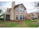 Inviting exterior of a two-story condo with updated features and a screened porch on the second story at 634 Steamboat Ct # 171, Altamonte Springs, FL 32714