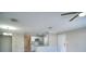 Open-concept kitchen featuring modern appliances, granite countertops, and a breakfast bar at 634 Steamboat Ct # 171, Altamonte Springs, FL 32714