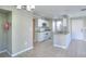Bright kitchen with tile flooring, white cabinetry, and modern appliances at 634 Steamboat Ct # 171, Altamonte Springs, FL 32714