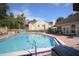 Inviting community pool and lounge area with ample seating for residents on a sunny day at 634 Steamboat Ct # 171, Altamonte Springs, FL 32714