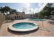 Inviting community pool, spa, and lounge area with ample seating for residents on a sunny day at 634 Steamboat Ct # 171, Altamonte Springs, FL 32714