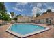 Inviting community pool and lounge area with ample seating for residents on a sunny day at 634 Steamboat Ct # 171, Altamonte Springs, FL 32714