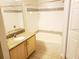 Bright bathroom featuring shower and tub combination, tile flooring, and granite countertop at 6412 Queens Borough Ave # 109, Orlando, FL 32835
