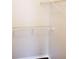A closet includes wood trim and wire shelving at 6412 Queens Borough Ave # 109, Orlando, FL 32835