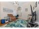 Relaxing bedroom features a large window and comfortable furniture at 6850 Huntington Hills Blvd, Lakeland, FL 33810