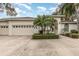 Charming single Gathering home featuring a 2-car garage and well-maintained landscaping at 6850 Huntington Hills Blvd, Lakeland, FL 33810