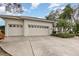 Beautiful home featuring a 2-car garage and a well-kept driveway at 6850 Huntington Hills Blvd, Lakeland, FL 33810