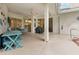Spacious outdoor patio with a dining area, barbecue grill, and access to the pool area at 6850 Huntington Hills Blvd, Lakeland, FL 33810