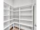 Organized shelving maximizes storage in this spacious walk-in pantry at 7013 Carrickbend Ln, Orlando, FL 32819