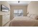 Bedroom features neutral walls, light carpet, and window with blinds at 740 Hillcrest Ln, Altamonte Springs, FL 32701