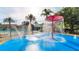 Fun splash pad area with colorful fountains and water features, perfect for to cool off and play at 8157 Fan Palm Way, Kissimmee, FL 34747