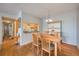 Cozy dining area with a wooden table set, adjacent to the kitchen, great for Gathering meals at 8215 Sun Spring Cir # 32, Orlando, FL 32825