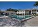 Community swimming pool featuring lounge chairs and building in the background at 8215 Sun Spring Cir # 32, Orlando, FL 32825