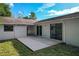 Backyard patio ideal for outdoor seating, and entertaining with easy access to the home at 902 Oleander St, New Smyrna Beach, FL 32168