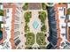 Aerial shot of a condo complex featuring an amazing courtyard, swimming pool, lush landscaping and beautiful walkways at 1 John Anderson Dr # 317, Ormond Beach, FL 32176