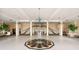 Grand lobby with marble flooring, staircase, chandeliers, and elegant decor at 1 John Anderson Dr # 317, Ormond Beach, FL 32176