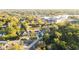 Spacious residential area featuring lush greenery and a modern home design at 1039 Morningside Dr, Eustis, FL 32726