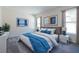 Staged main bedroom features plush carpet flooring, modern furniture and calming decor at 1039 Morningside Dr, Eustis, FL 32726