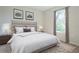 Comfortable bedroom with a queen bed and plenty of natural light at 1045 Morningside Dr, Eustis, FL 32726