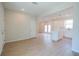 Open-concept living space seamlessly connecting the living room, kitchen, and dining area, enhancing flow and functionality at 1045 Morningside Dr, Eustis, FL 32726