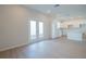 Bright and airy living space with access to the backyard, seamlessly connecting indoor and outdoor living areas at 1045 Morningside Dr, Eustis, FL 32726