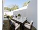 An outdoor patio with dining and seating, perfect for relaxing or entertaining in the backyard at 1045 Morningside Dr, Eustis, FL 32726